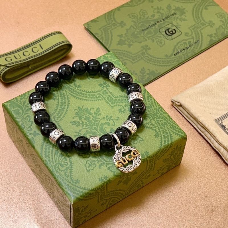 G*u*i bracelets